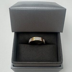 Gold tone ring.